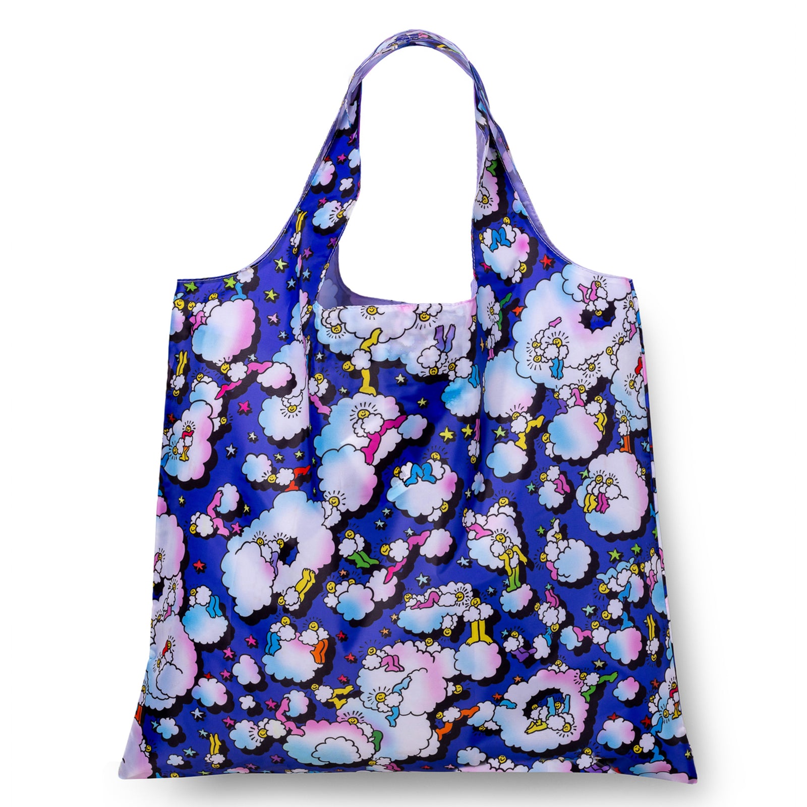 A reusable tote bag featuring a vibrant cartoon pattern of puffy pastel clouds and small characters on a deep blue background, shown against a plain white studio backdrop.
