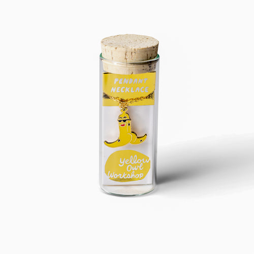 Banana split cloisonné enamel pendant necklace by Kristina Micotti in glass vial packaging by Yellow Owl Workshop