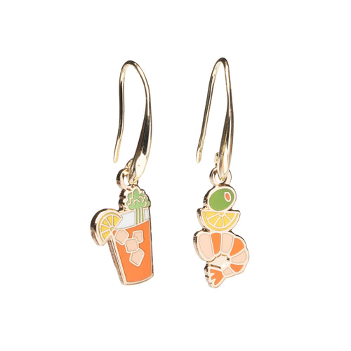 Mismatched enamel drop earrings featuring Bloody Mary cocktail with celery and lemon and stacked shrimp cocktail with olive by Yellow Owl Workshop