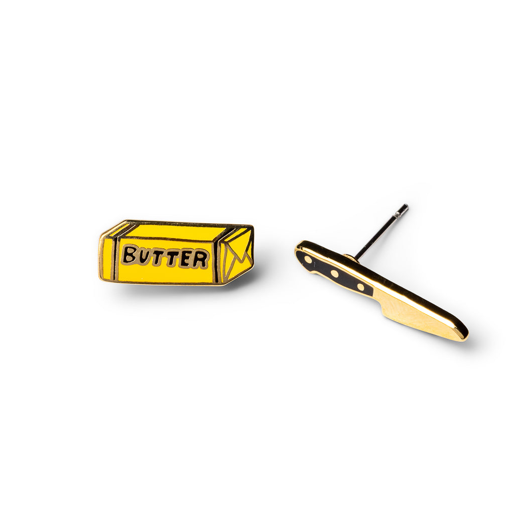 Mismatched cloisonné stud earrings featuring yellow butter block and gold butter knife gilded in 22 karat gold by Yellow Owl Workshop