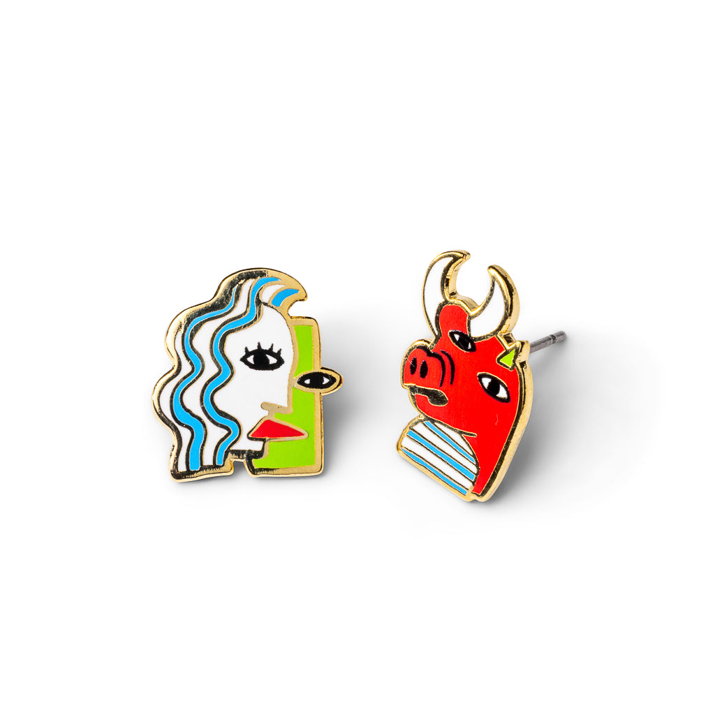 Mismatched cloisonné stud earrings featuring cubist face with blue wavy hair and bold red bull gilded in 22 karat gold by Yellow Owl Workshop