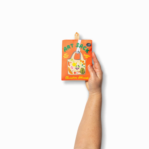 Person holding peach illustrated fruit tote bag with colorful tropical and seasonal fruit print by Yellow Owl Workshop