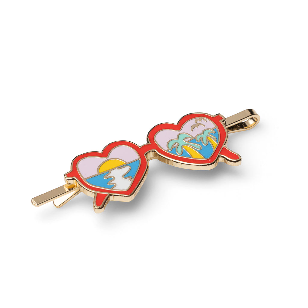 Gold cloisonné enamel heart sunglasses hair pin with sunset ocean and palm tree scene by Yellow Owl Workshop