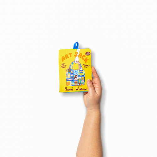 Person holding illustrated kawaii cat tote bag with colorful pantry and food icon print by Naomi Wilkinson for Yellow Owl Workshop