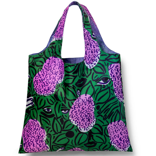 Illustrated reusable tote bag featuring loosely painted lilac blooms with hidden eyes and lips in the greenery by Sophy Naess for Yellow Owl Workshop