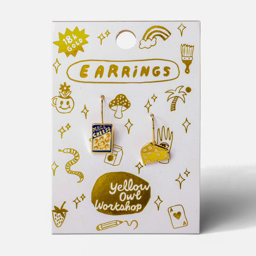 Mac and Cheese mismatched enamel drop earrings on gold foil matchbook card by Yellow Owl Workshop