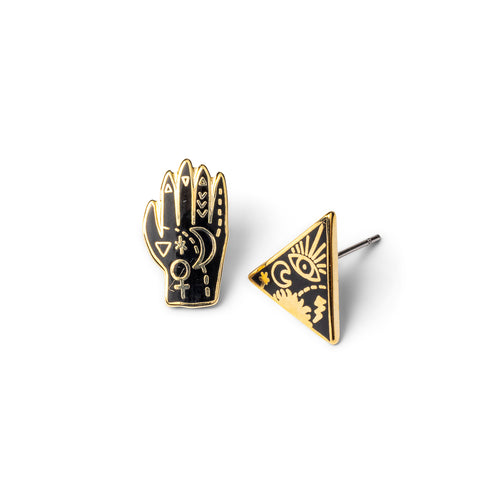 Mismatched cloisonné stud earrings featuring black and gold hamsa hand and all-seeing eye triangle by Yellow Owl Workshop