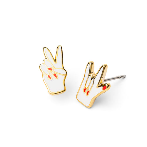 Mismatched gold stud earrings featuring white enamel peace sign hand and love hand sign with red nails by Yellow Owl Workshop