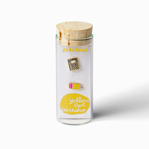 Pencil and Notebook mismatched gold stud earrings in gift-ready glass vial by Yellow Owl Workshop