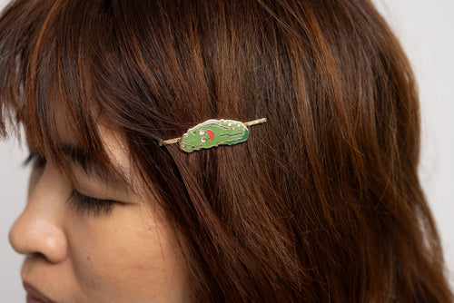 Pickle Guy gold cloisonné enamel hair pin worn in hair by Yellow Owl Workshop