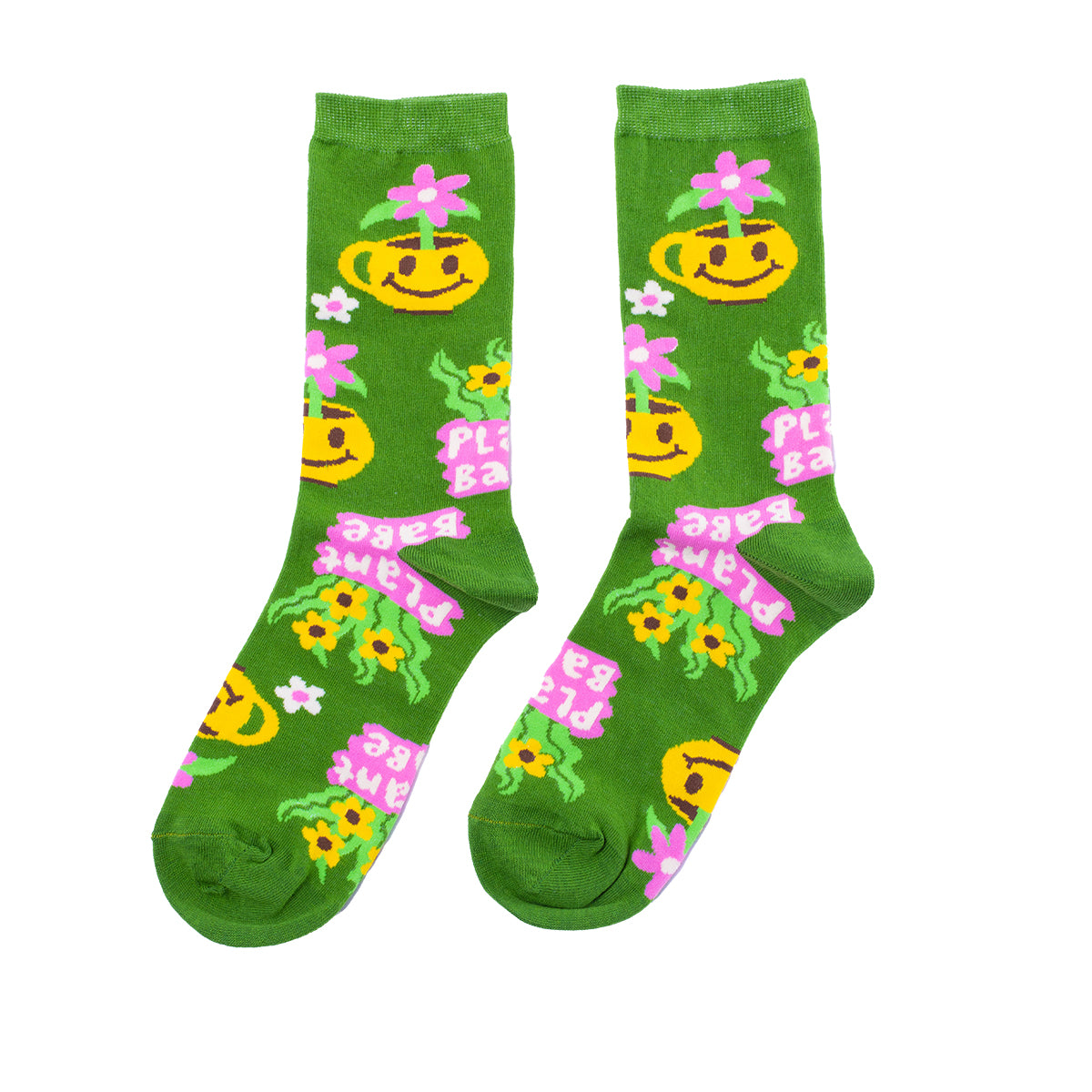 Green crew socks featuring smiley face potted plants pink flowers sunflowers and Plant Babe text by Yellow Owl Workshop