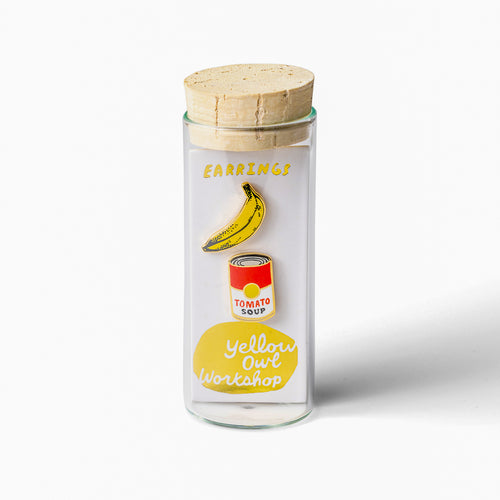 Pop Art Banana and Soup mismatched gold stud earrings in gift-ready glass vial by Yellow Owl Workshop
