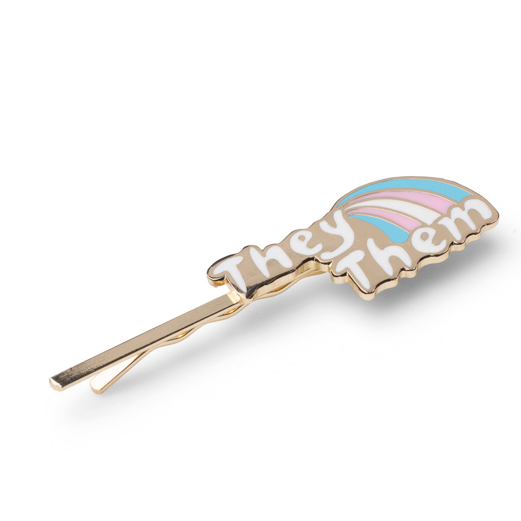 Gold cloisonné enamel They Them hair pin in trans flag colors with pink white and blue rainbow by Yellow Owl Workshop