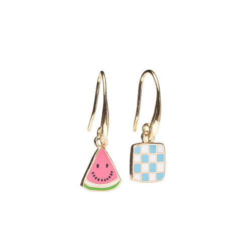 Mismatched enamel drop earrings featuring smiling watermelon slice and blue and white checkerboard picnic blanket by Yellow Owl Workshop
