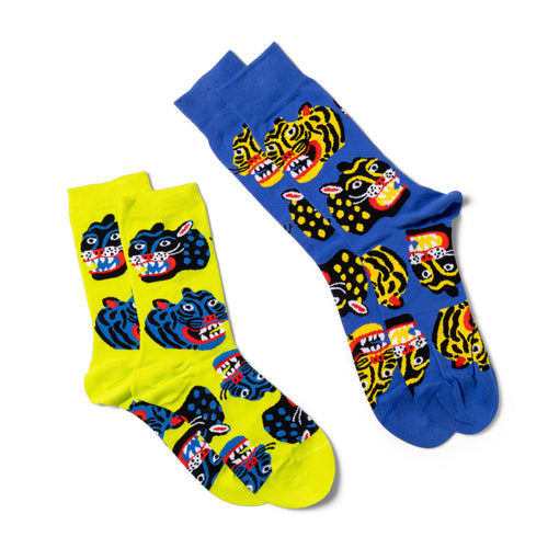 Wild Cats crew socks small and large sizes laid out side by side by Yellow Owl Workshop