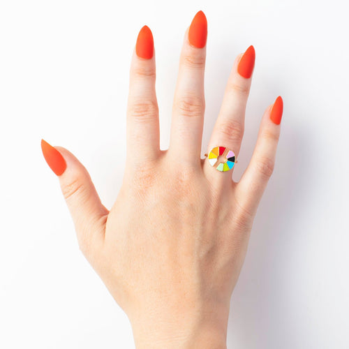 Color wheel cloisonné enamel gold ring worn on hand by Yellow Owl Workshop