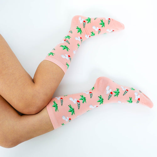 Peach Weed crew socks with cannabis leaf and joint print worn on feet by Yellow Owl Workshop