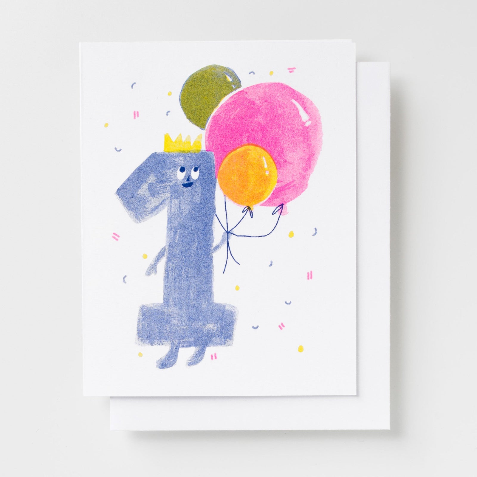Risograph greeting card with an illustrated number one character wearing a gold crown and holding pink, orange, and green balloons on a white background with confetti